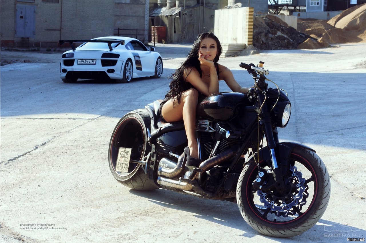 Sexy model Brunettes on a motorcycle in Jimo